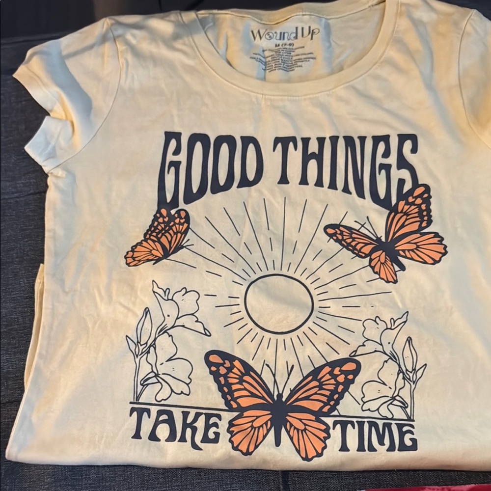 Wound Up Cream and Orange Short Sleeve Tee with Butterfly Design
